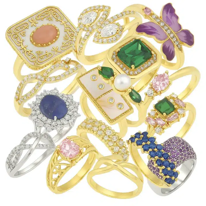 Assorted luxury jewelry products including rings, pendants, and bracelets